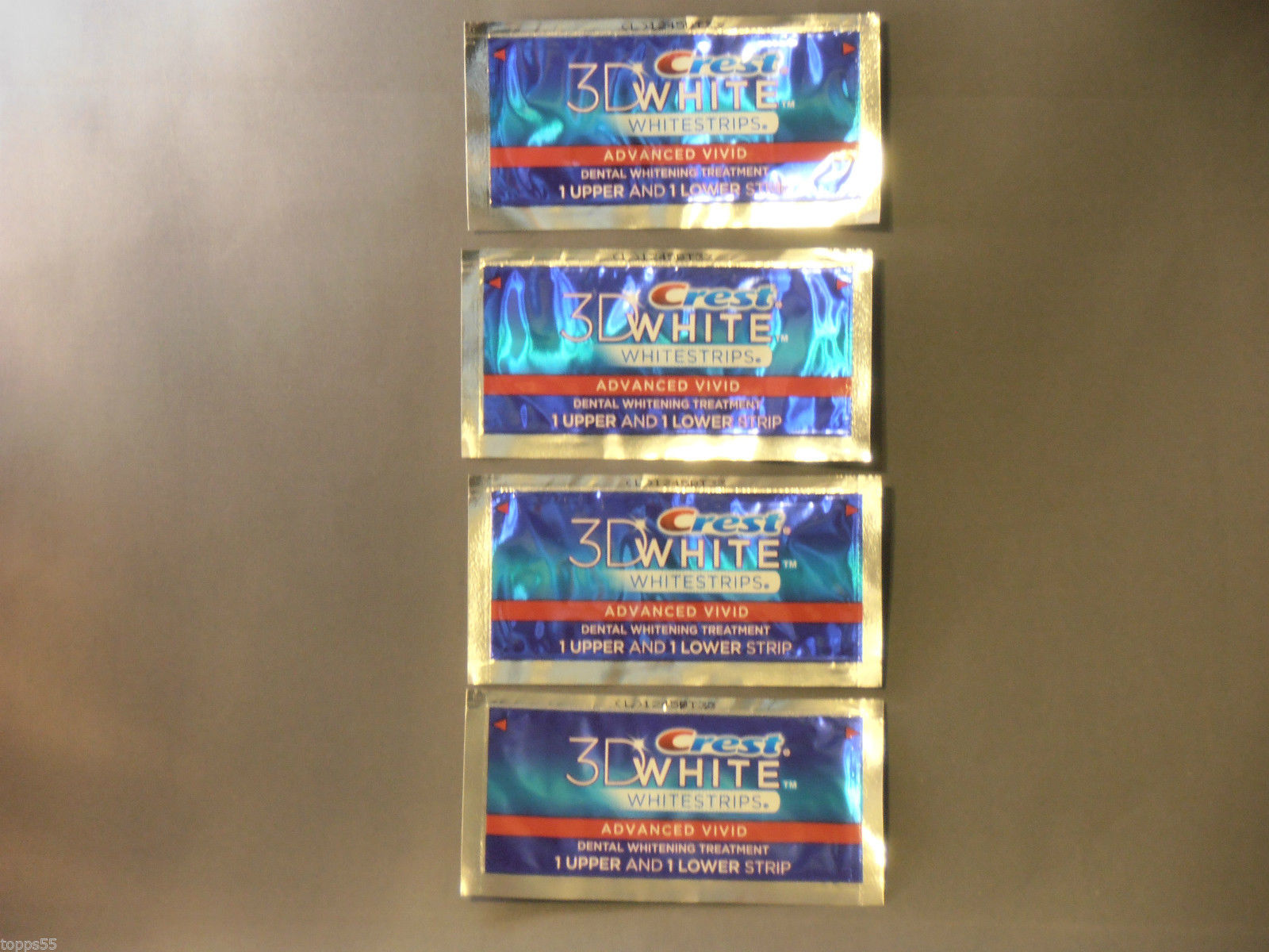 New Crest 3D Dental Whitestrips Advanced Vivid 8 Whitening Strips in 4 Pouches -- US Delivery